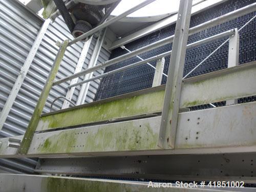 Used Baltimore Aircoil Series 3000 Induced Draft, Crossflow Single Cell Cooling Tower, Nominal 985 Tons, Model 3985A/V. Galvanized steel housing, 304 stainless steel cold water basin. Vertical air di...