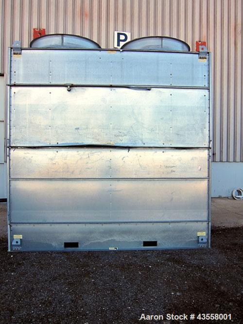Used Baltimore Aircoil FXV Closed Circuit Cooling Tower, Model FXV-444DP. Nominal tons 140. Galvanized steel housing. Designed to cool 420 gallons per minute from 95 degrees F hot to 85 degrees F. co...