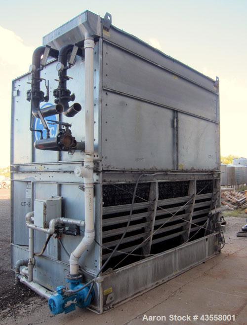 Used Baltimore Aircoil FXV Closed Circuit Cooling Tower, Model FXV-444DP. Nominal tons 140. Galvanized steel housing. Designed to cool 420 gallons per minute from 95 degrees F hot to 85 degrees F. co...