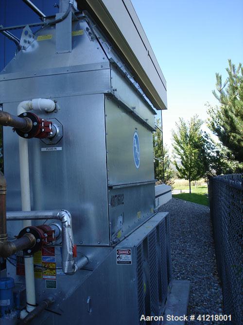 Used BAC 35 Ton Series V Closed Circuit Cooling Tower, Model VFI-027-21K. Mfg 2006. 208V, 60 hz, 3 phase. Dry type fluid cooler, 3 cooling tower fans, 15 hp, belt drive. Design wet bulb temperature 6...