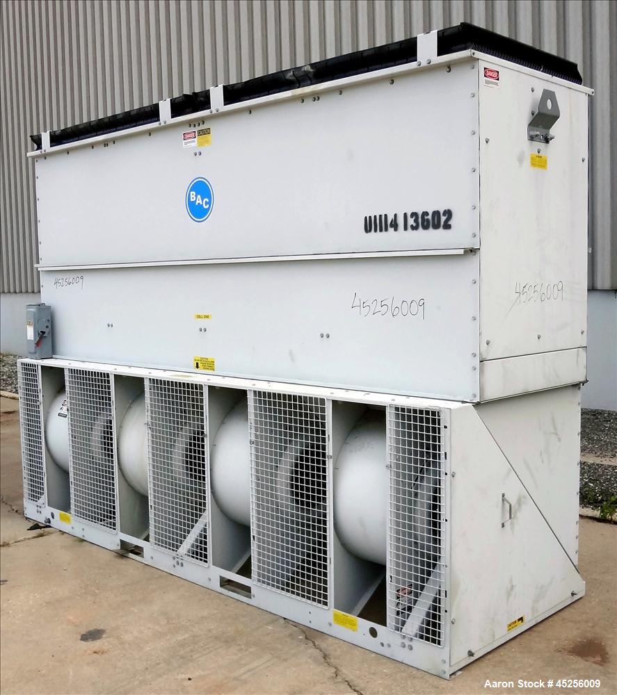 Used Baltimore Aircoil Cooling Tower, Model VXT-105C. Approximately 105 ton capacity. Galvanized housing, forced draft, pressurized water distribution, centrifugal fans, approximate 23,100 cfm, drive...