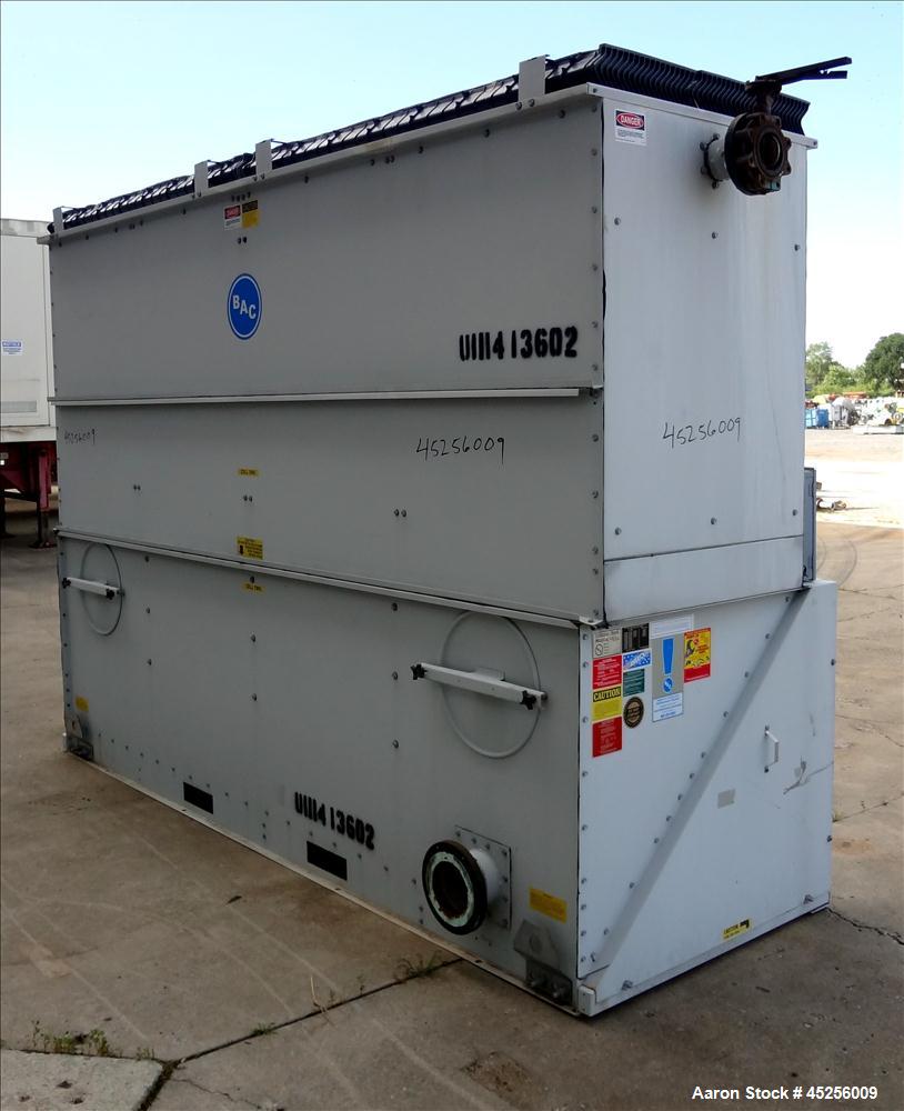 Used Baltimore Aircoil Cooling Tower, Model VXT-105C. Approximately 105 ton capacity. Galvanized housing, forced draft, pressurized water distribution, centrifugal fans, approximate 23,100 cfm, drive...