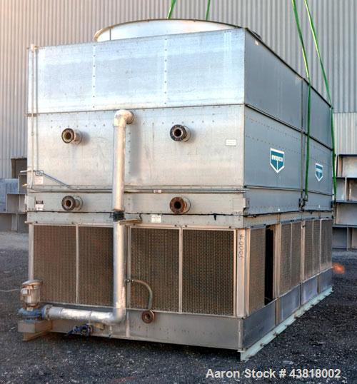 Used Evapco Closed Circuit Cooling Tower, Model ATW 276C. Nominal capacity 1066 tons. Galvanized steel housing, 304 stainless steel basin. Unit designed to cool 1600 gallons per minute from 95 degree...