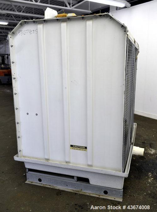 Used Marley Series 3800 Aquatower Single Cell Cooling Tower, Model 3842, Approximately 60 Nominal Tons. Fiberglass housing. Approximately 42” diameter fan, driven by an a 3hp, 3/60/230/460 volt, 1730...