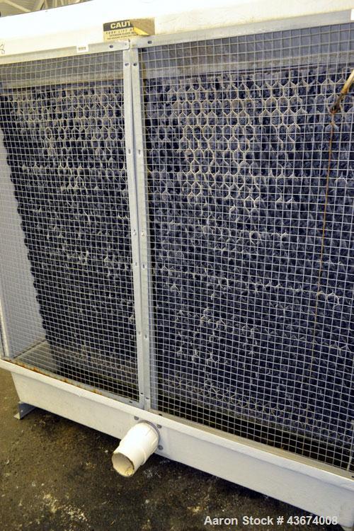 Used Marley Series 3800 Aquatower Single Cell Cooling Tower, Model 3842, Approximately 60 Nominal Tons. Fiberglass housing. Approximately 42” diameter fan, driven by an a 3hp, 3/60/230/460 volt, 1730...