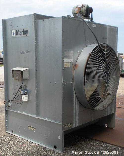 Used Marley Aquatower Cooling Tower, Model 4852. Nominal capacity 85 ton, 255 gallons per minute. Single cell, galvanized housing. Hot 95, cold 85, 10 degree range. 48" diameter fan driven by a 3 hp,...