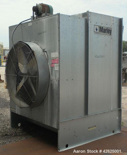 Used Marley Aquatower Cooling Tower, Model 4852. Nominal capacity 85 ton, 255 gallons per minute. Single cell, galvanized housing. Hot 95, cold 85, 10 degree range. 48" diameter fan driven by a 3 hp,...