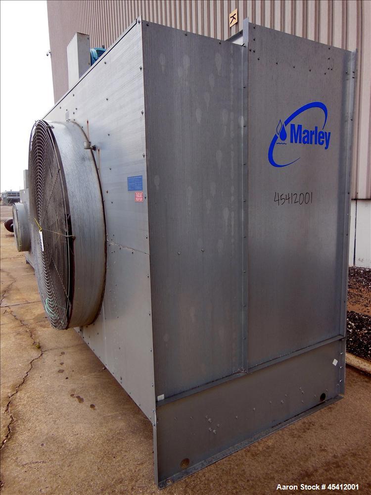 Used Marley Aquatower Single Cell Cooling Tower, Model 496B. Approximately 126 nominal tons, galvanized steel housing. Designed to cool 400 gallons per minute at 102 degrees F hot water, 87 degrees F...