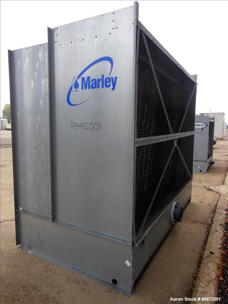Used Marley Aquatower Single Cell Cooling Tower, Model 496B. Approximately 126 nominal tons, galvanized steel housing. Designed to cool 400 gallons per minute at 102 degrees F hot water, 87 degrees F...