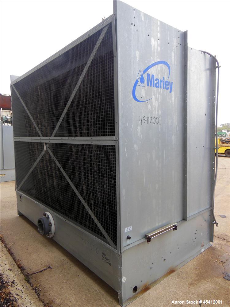 Used Marley Aquatower Single Cell Cooling Tower, Model 496B. Approximately 126 nominal tons, galvanized steel housing. Designed to cool 400 gallons per minute at 102 degrees F hot water, 87 degrees F...