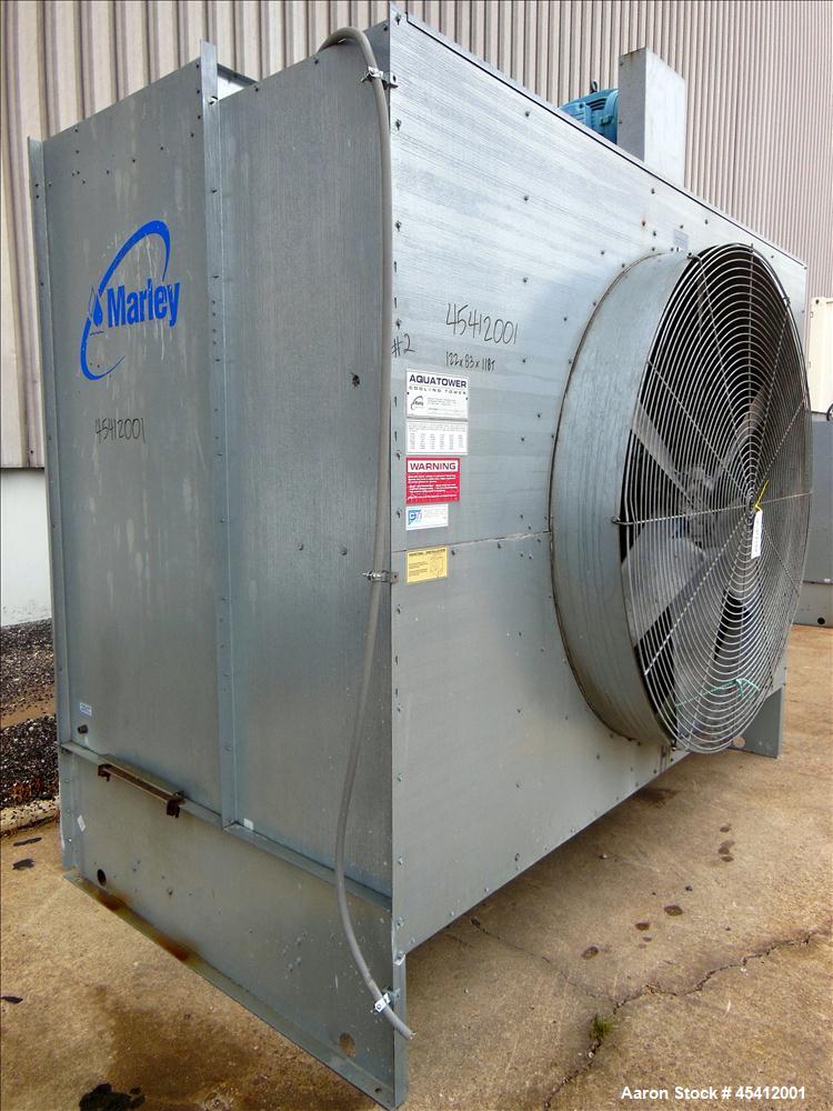 Used Marley Aquatower Single Cell Cooling Tower, Model 496B. Approximately 126 nominal tons, galvanized steel housing. Designed to cool 400 gallons per minute at 102 degrees F hot water, 87 degrees F...