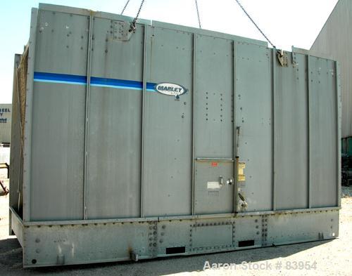 USED: Marley cooling tower, model NC412, nominal capacity 379 ton. Single cell. Galvanized steel housing. 8' diameter fan, driven by a 25 hp, 3/60/230/460 volt, 1770 rpm motor.