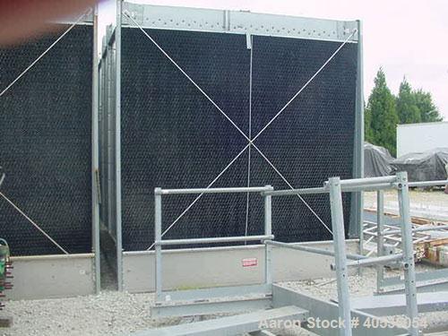 Used Marley Model NC5201CS Serial Cooling Tower, 403 ton. Cooling 1209 GPM of water from 95 deg F to 85 deg F at a 78 deg F wet bulb at 20 hp fan motor. Dimensions: 18'9" wide x 10'10 3/4" long x 12'...