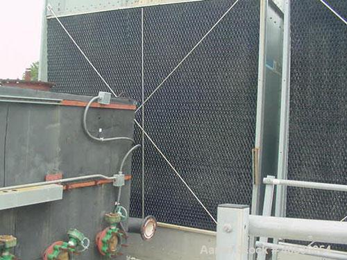 Used Marley Model NC5201CS Serial Cooling Tower, 403 ton. Cooling 1209 GPM of water from 95 deg F to 85 deg F at a 78 deg F wet bulb at 20 hp fan motor. Dimensions: 18'9" wide x 10'10 3/4" long x 12'...