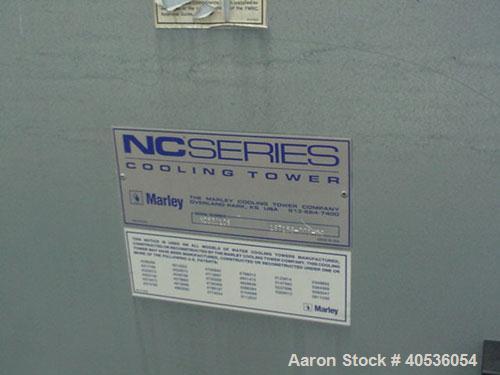 Used Marley Model NC5201CS Serial Cooling Tower, 403 ton. Cooling 1209 GPM of water from 95 deg F to 85 deg F at a 78 deg F wet bulb at 20 hp fan motor. Dimensions: 18'9" wide x 10'10 3/4" long x 12'...