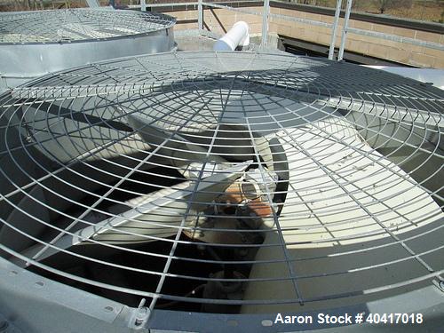 Used Marley Cooling Tower, Model NC8305BG, 450 ton, built 2006, hot and cold basins are stainless steel.