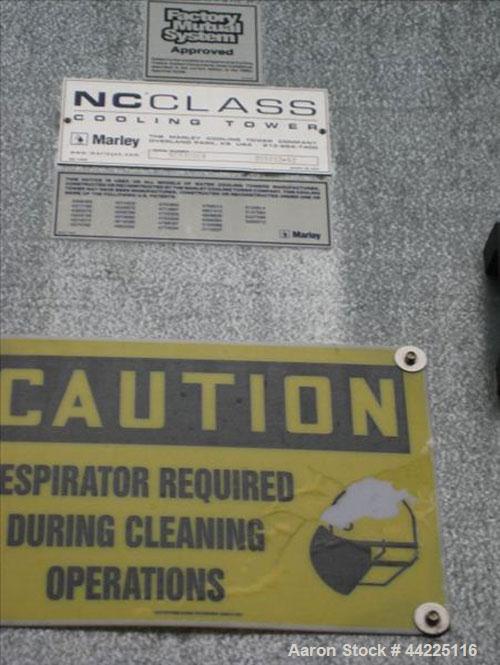 Used Marley Cooling Tower, Model NC8309-E2CS, Approximately 1126 Tons. Nominally rated 16.9 mm btu/hr, 3380 gpm flow rate, 25 hp fan, 460 volt. Serial #205632-NC8309E-2CS-01. Built 2001.