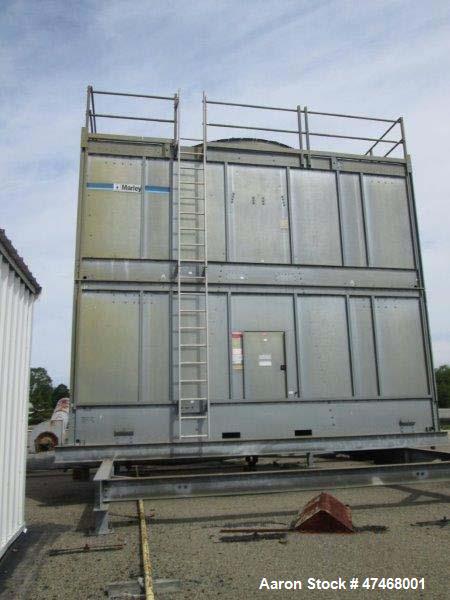 Used Marley Cooling Tower, Model NC 9201. 1200 gallons per minute of cooling water from 57 degrees F to 48 degrees F. Nominal rating 673 tons. Marley series 22.3 gear reducer, reduction ratio 6.12/1....