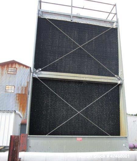 Used Marley Cooling Tower, Model NC 9201. 1200 gallons per minute of cooling water from 57 degrees F to 48 degrees F. Nominal rating 673 tons. Marley series 22.3 gear reducer, reduction ratio 6.12/1....