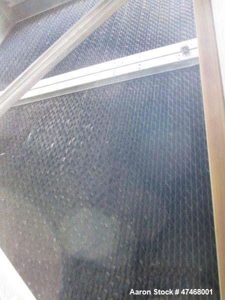 Used Marley Cooling Tower, Model NC 9201. 1200 gallons per minute of cooling water from 57 degrees F to 48 degrees F. Nominal rating 673 tons. Marley series 22.3 gear reducer, reduction ratio 6.12/1....