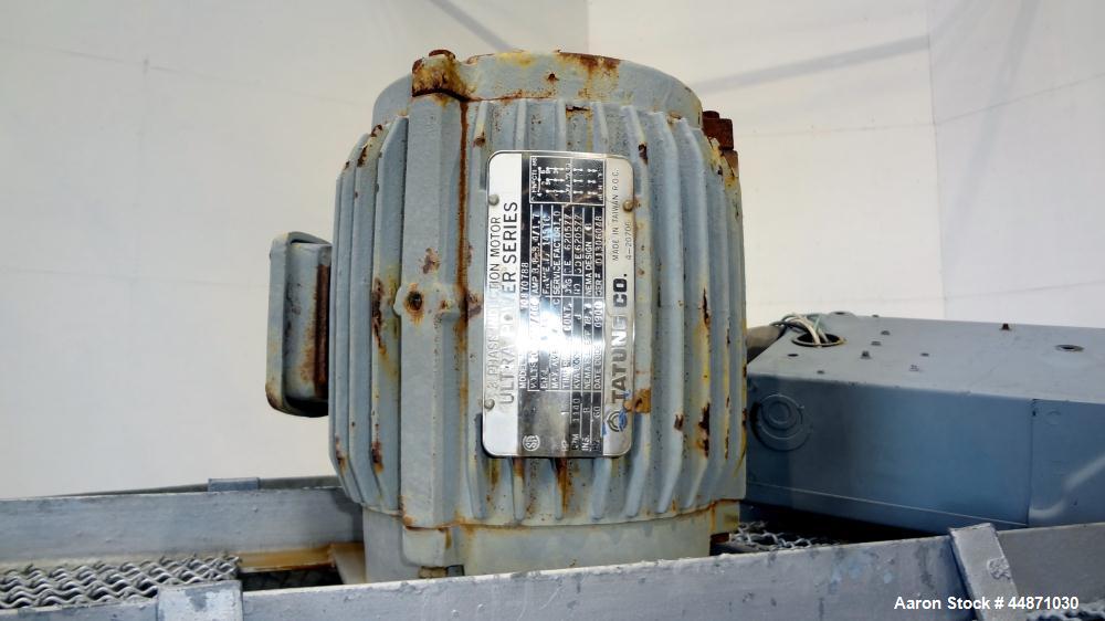 Used Thermal Care FT Series Cooling Tower, Fiberglass Construction. Cooling capacity 22 tons, nominal 66 gallons per minute. Includes an approximate 24" diameter top mounted fan, driven by a 1hp, 3/6...