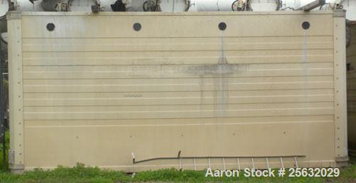 Used Tower Tech Cooling Tower, approximate tons, model TTMT-288-319, fiberglass construction. Rated gallons per minute. Includes misc piping and legs.