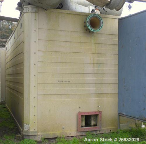 Used Tower Tech Cooling Tower, approximate tons, model TTMT-288-319, fiberglass construction. Rated gallons per minute. Includes misc piping and legs.