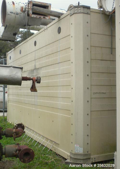Used Tower Tech Cooling Tower, approximate tons, model TTMT-288-319, fiberglass construction. Rated gallons per minute. Includes misc piping and legs.