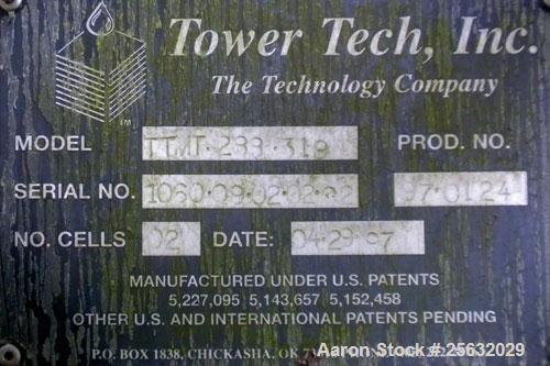 Used Tower Tech Cooling Tower, approximate tons, model TTMT-288-319, fiberglass construction. Rated gallons per minute. Includes misc piping and legs.