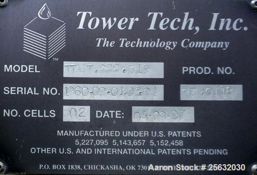 Used Tower Tech Cooling Tower, Model TTMT-288-319, fiberglass construction. Rated gallons per minute. Includes misc piping and legs.