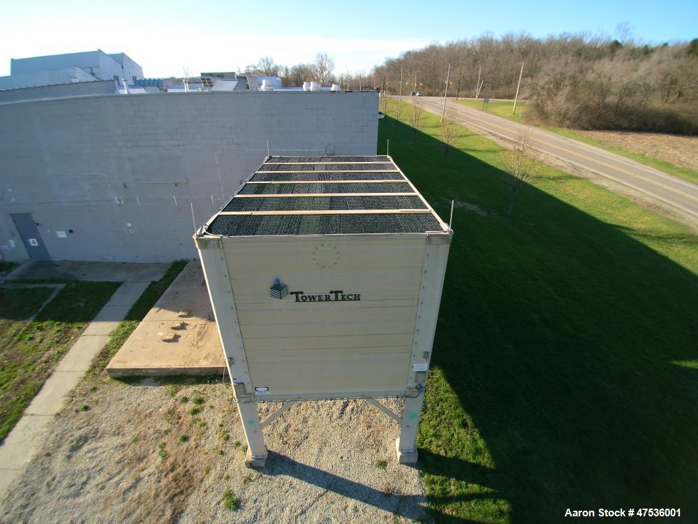 Used Tower Tech Cooling Tower, Model TTXE-061975. Water collection system, Flow-Thru basin, variable flow rotary spray nozzle flows ~100-300 gpm/nozzle at 0.5  1.5 psi. (6) 7.5 hp fan motor, 860 rpm,...