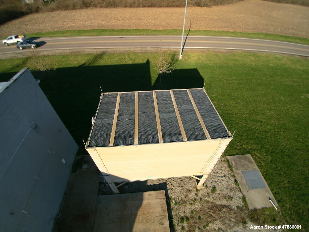 Used Tower Tech Cooling Tower, Model TTXE-061975. Water collection system, Flow-Thru basin, variable flow rotary spray nozzle flows ~100-300 gpm/nozzle at 0.5  1.5 psi. (6) 7.5 hp fan motor, 860 rpm,...