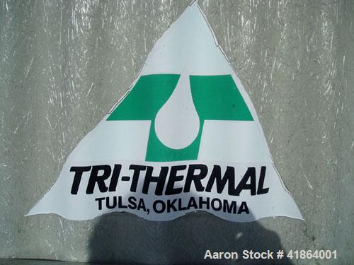 Used Tri-Thermal 300 Ton Stainless Steel Cooling Tower. Flow rate of approximately 900 gpm.