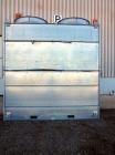Used Baltimore Aircoil FXV Closed Circuit Cooling Tower, Model FXV-444DP. Nominal tons 140. Galvanized steel housing. Designed to cool 420 gallons per minute from 95 degrees F hot to 85 degrees F. co...