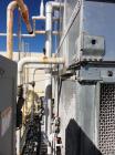 Used Evapco Cooling Tower, 800 ton, model ATC-892B.  60 Hz, 480 volt.  Mounted on an I-beam frame.