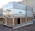 Used Evapco Closed Circuit Cooling Tower, Model ATW 276C. Nominal capacity 1066 tons. Galvanized steel housing, 304 stainless steel basin. Unit designed to cool 1600 gallons per minute from 95 degree...