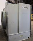 Used Marley Series 4800 Aquatower Single Cell Cooling Tower, Model 4862, Approximately 125 Nominal Tons. Galvanized steel housing. Designed to cool 750 gallons per minute. Approximately 52’’ diameter...