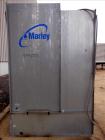 Used Marley Aquatower Single Cell Cooling Tower, Model 496B. Approximately 126 nominal tons, galvanized steel housing. Designed to cool 400 gallons per minute at 102 degrees F hot water, 87 degrees F...