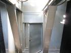 Used Marley Cooling Tower, Model NC8305BG, 450 ton, built 2006, hot and cold basins are stainless steel.