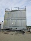 Used Marley Cooling Tower, Model NC 9201. 1200 gallons per minute of cooling water from 57 degrees F to 48 degrees F. Nominal rating 673 tons. Marley series 22.3 gear reducer, reduction ratio 6.12/1....