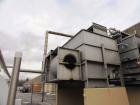 Used Mojonnier Cooling Tower, 180 ton, model AEC149.  Galvanized housing with super heater for additional refrigeration capacity.  Side mounted twin fans.