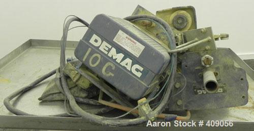 Used Demag 1/2 Ton Hoist, Chain 5 x 15. .85 KW, 3/50/415 Volt, 2770/665 RPM. Includes button controls.