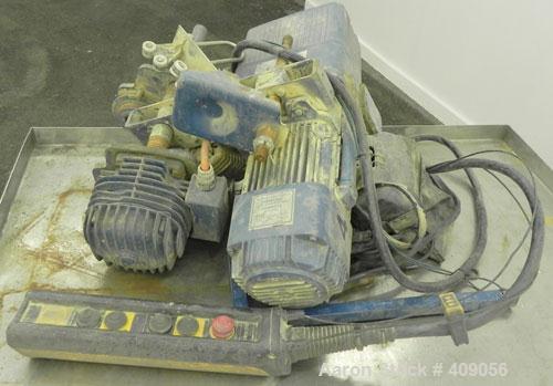 Used Demag 1/2 Ton Hoist, Chain 5 x 15. .85 KW, 3/50/415 Volt, 2770/665 RPM. Includes button controls.