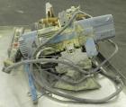 Used Demag 1/2 Ton Hoist, Chain 5 x 15. .85 KW, 3/50/415 Volt, 2770/665 RPM. Includes button controls.