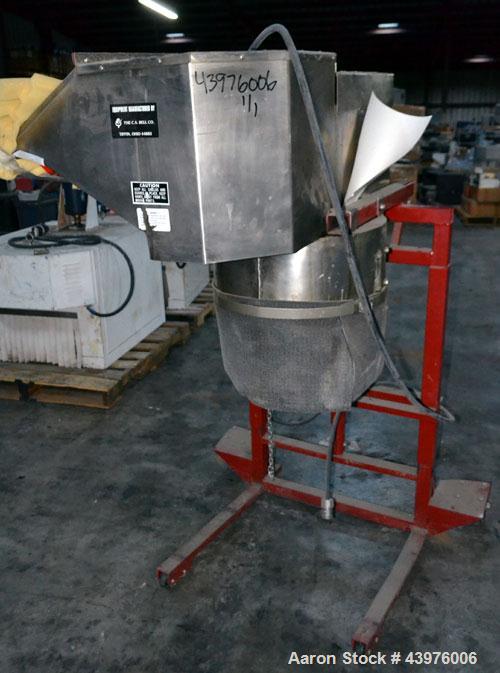 Used C.S. Bell Glass Crusher, Model HMG-05P-MSS, Stainless Steel.  Rated capacity over 2 tons per hour, accepts containers up to 1 gallon size.  Fits over 30 and 55 gallon standard drums. Mounted on ...