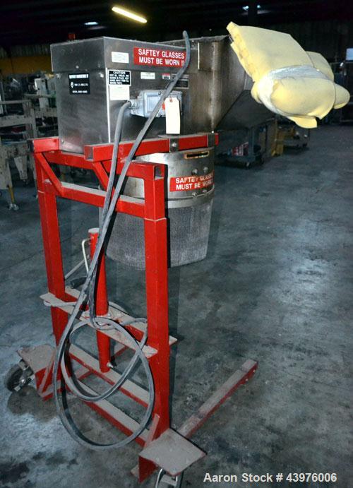 Used C.S. Bell Glass Crusher, Model HMG-05P-MSS, Stainless Steel.  Rated capacity over 2 tons per hour, accepts containers up to 1 gallon size.  Fits over 30 and 55 gallon standard drums. Mounted on ...