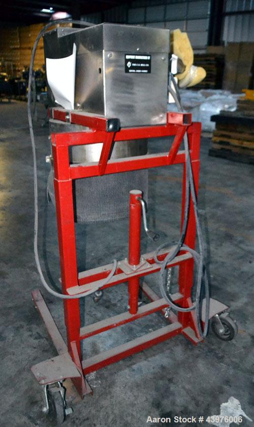 Used C.S. Bell Glass Crusher, Model HMG-05P-MSS, Stainless Steel.  Rated capacity over 2 tons per hour, accepts containers up to 1 gallon size.  Fits over 30 and 55 gallon standard drums. Mounted on ...