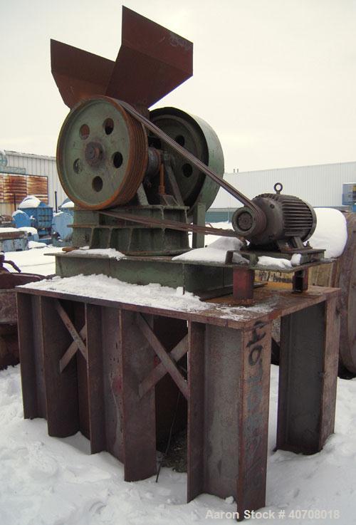 Used Denver Equipment Company 8 x 10 Jaw Crusher, Type H, carbon steel. Top feed with  hopper, bottom discharge. Driven by a 10 hp, 3/208-230/460, 1760 rpm motor. Mounted on a 45" tall stand for bott...