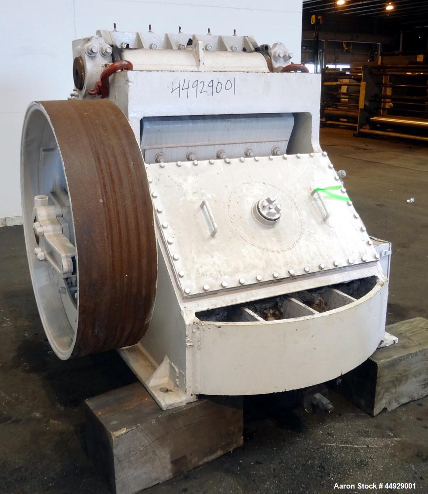 Used Kue Ken Jaw Crusher, Model 10 X 36, Carbon Steel.  Approximate feed 10” x 36”. Capacity in short tons per hour 1” at 32-50, 3” at 95-135.  Requires motor.  RPM range 350-390.