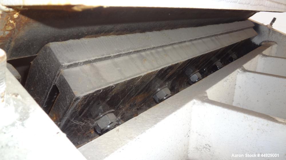 Used Kue Ken Jaw Crusher, Model 10 X 36, Carbon Steel.  Approximate feed 10” x 36”. Capacity in short tons per hour 1” at 32-50, 3” at 95-135.  Requires motor.  RPM range 350-390.